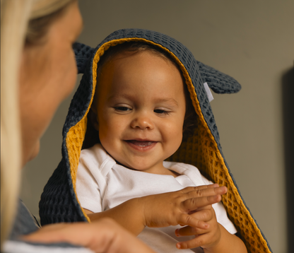 Cape de bain bébé en nid d'abeille